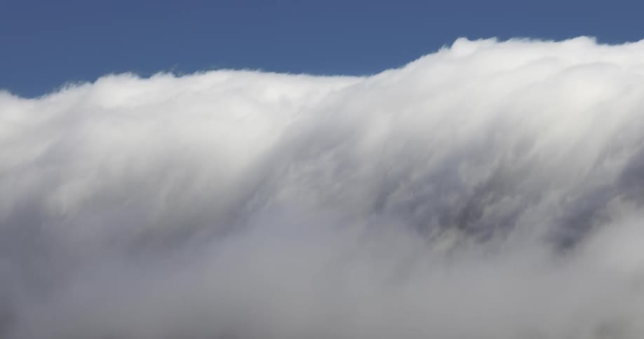 The fog rolls down in the sky