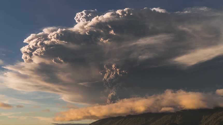 A storm is brewing in the sky from the wind and clouds