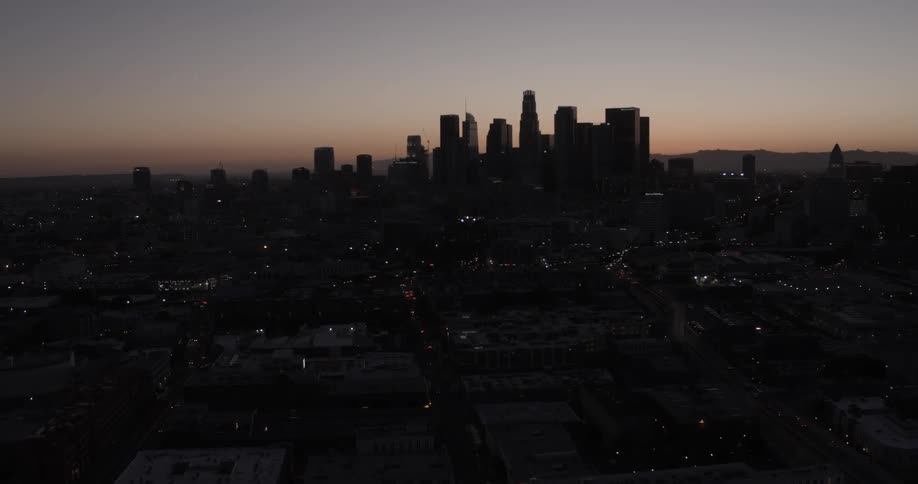 City lights glow at dusk