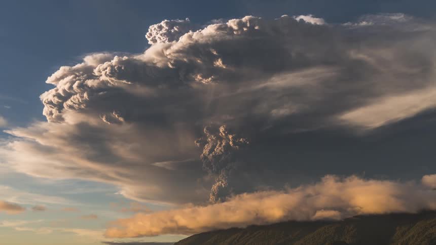 Time lapse of a cloud of ash growing over an erupting volcano