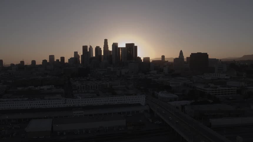 A city skyline as the sun goes down