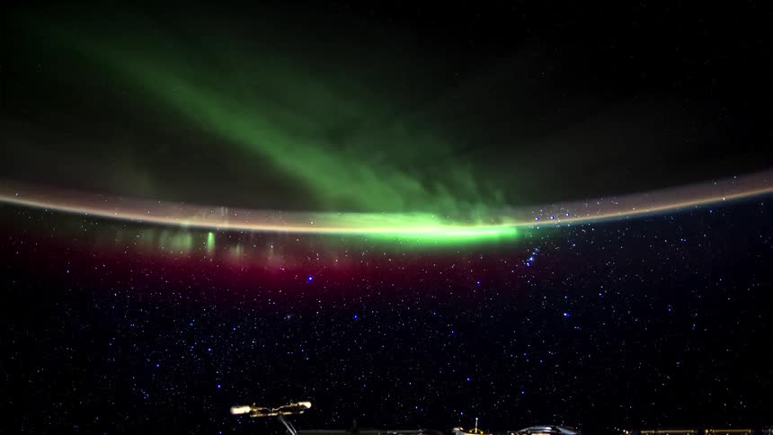 Panorama of the curvature of planet earth seen from starry space with aurora borealis