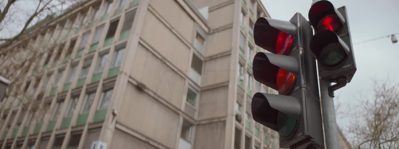 A traffic light in a city is directing traffic