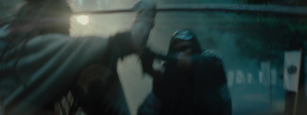 Two men are fighting with spears