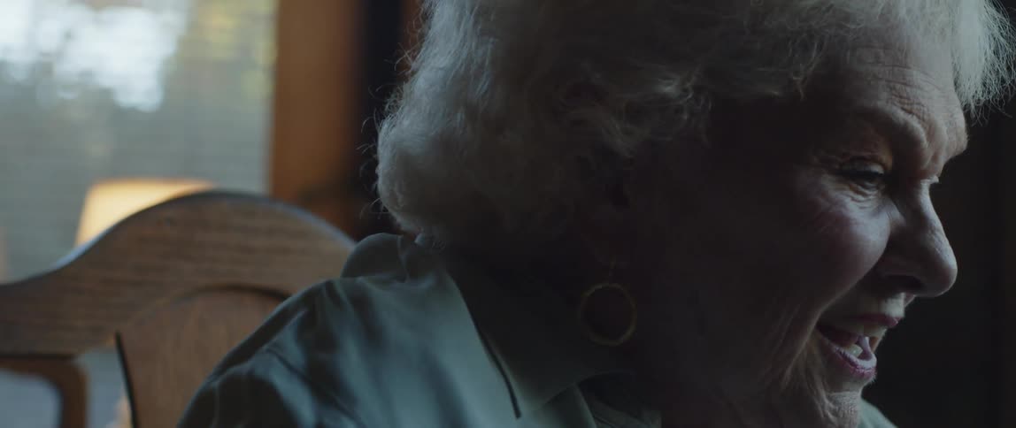 Elderly lady sitting talking