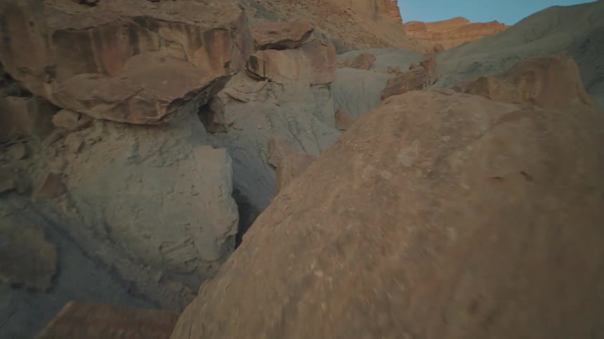 Boulders piled around mountains