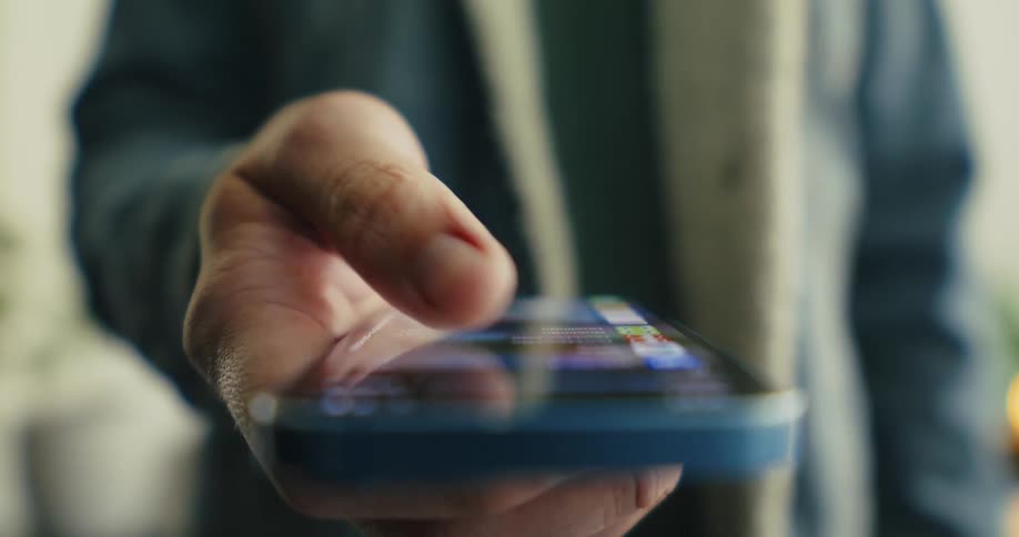 Closeup of hand using a smartphone