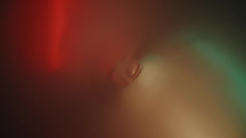 Extreme closeup on an abstract and colorful interior with smoke coming in
