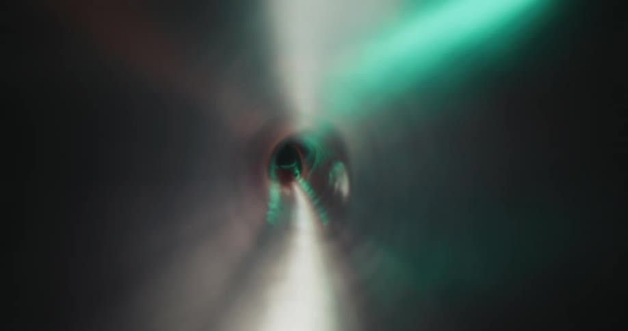 The light reflects through the narrow tube