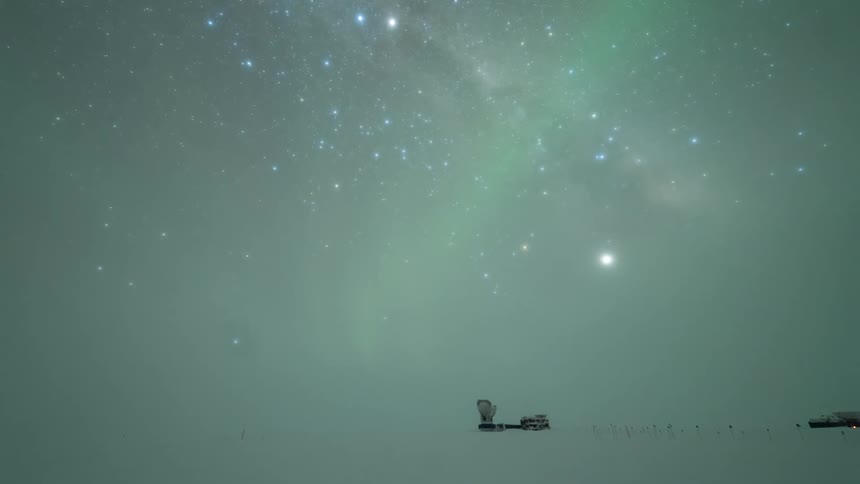 The aurora flares in the starry sky