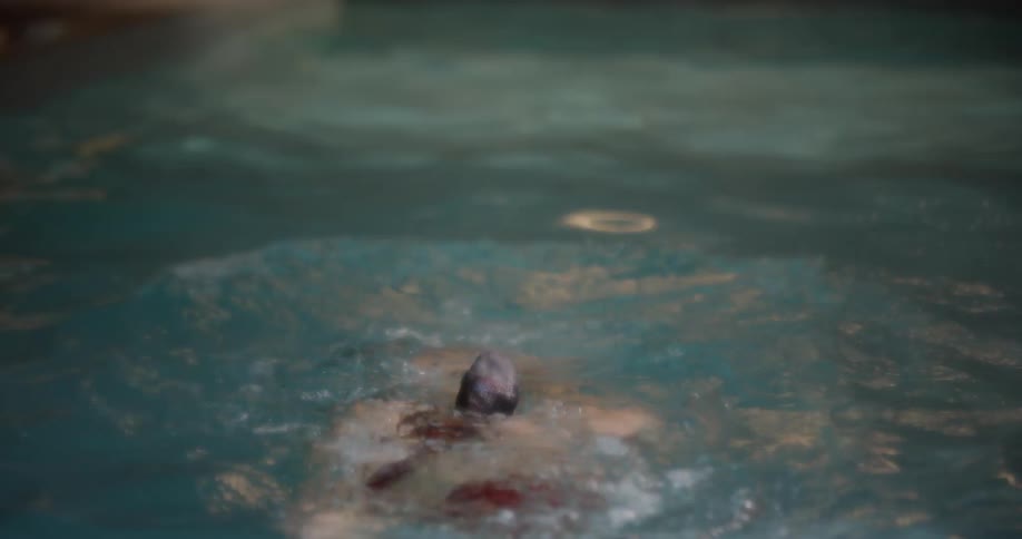 Two friends have fun in the pool