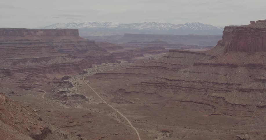 A fog covers the large canyon