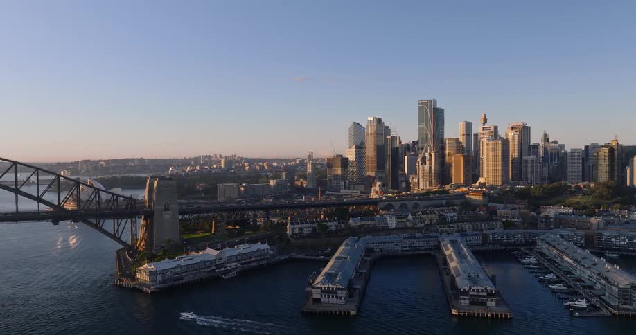 Aerial view of the piers and skyline of sydney at sunrise
