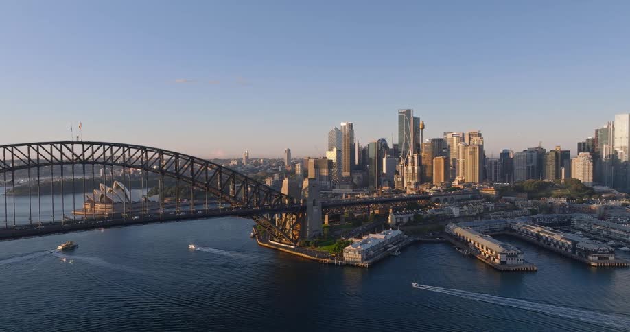 Panorama of a bridge over the sea and in the background the metropolis