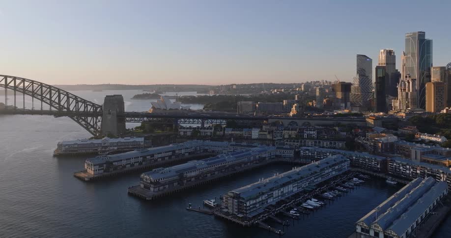 Aerial scenery of metropolises composed of buildings bridge and seaside