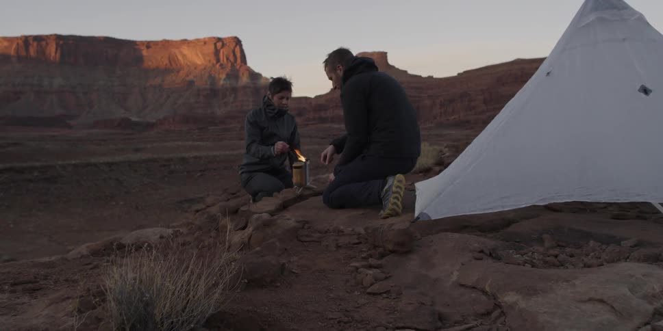 Two people set a fire at a camp