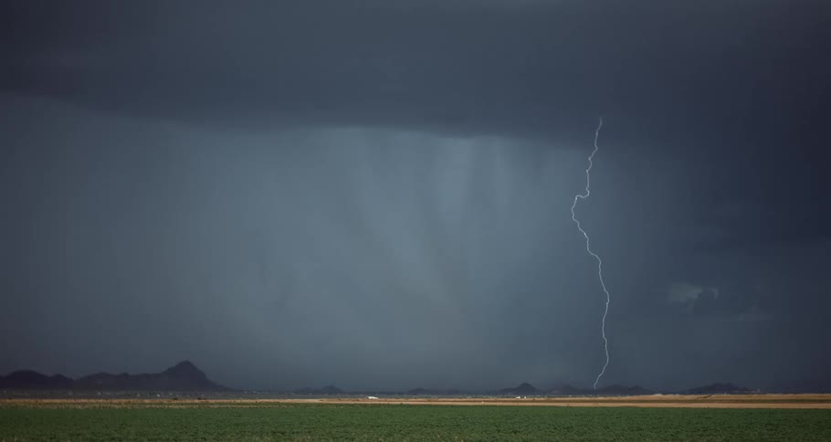 A thunderstorm with gray clouds in the sky