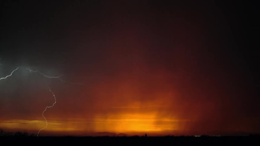 A dramatic landscape with lightning bolts striking the horizon under an ominous sky