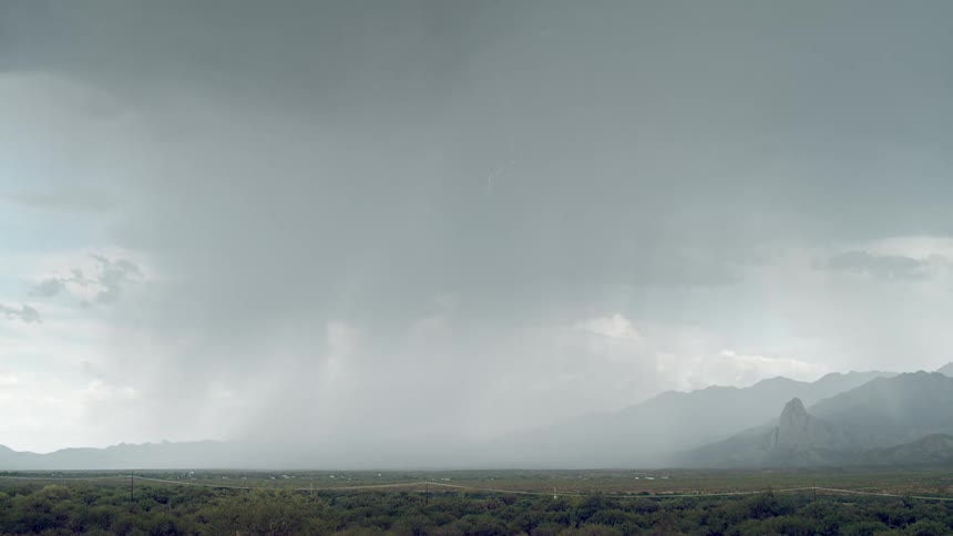 Lightning flashes as it rains