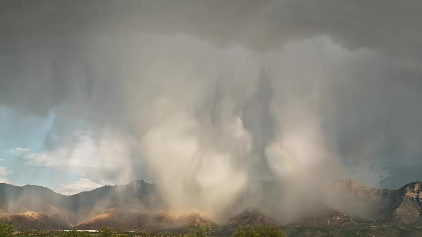 Heavy rain with lightning fall on the mountains
