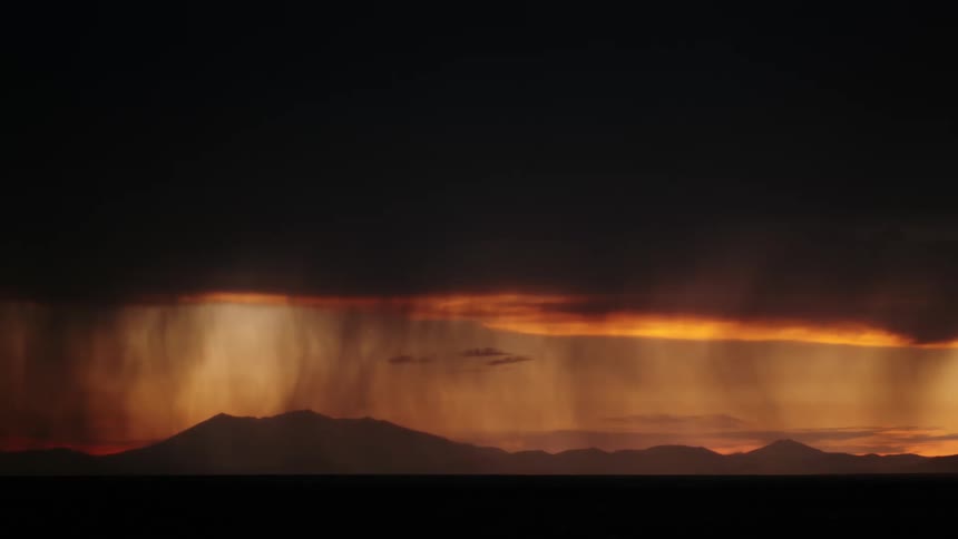 A large storm blackens the sky