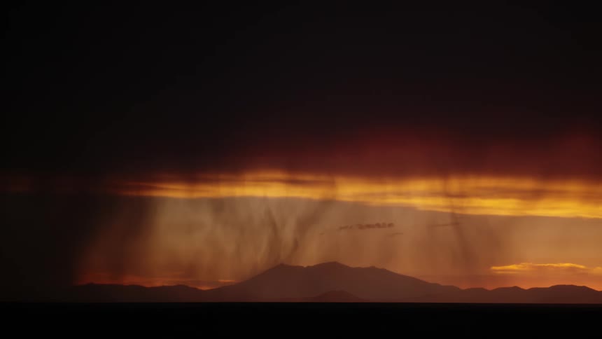 A storm is raging at sunset