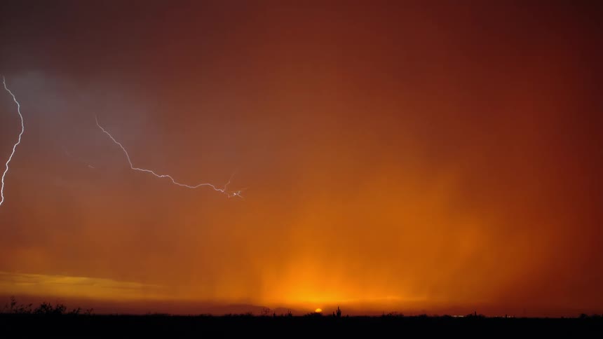 A time lapse shows multiple lightning bolts being emitted from dark storm clouds