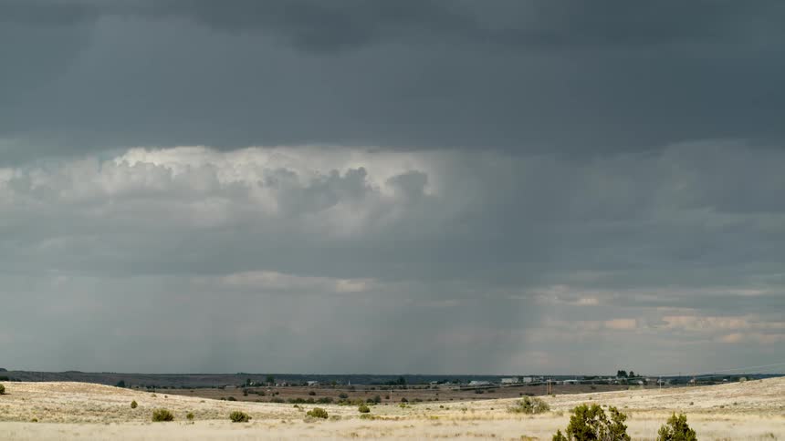Multiple lightning strikes come from the storm clouds