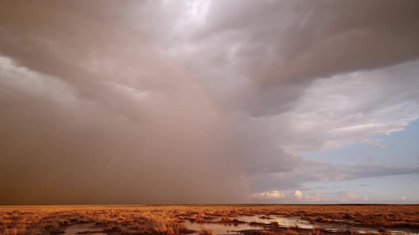 Bright lightning during a thunderstorm under fields