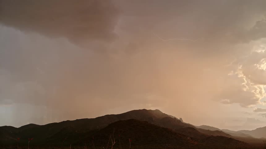 Lightning moves through the heavy storm clouds