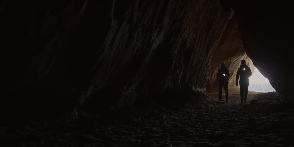 Two men walk into a cave