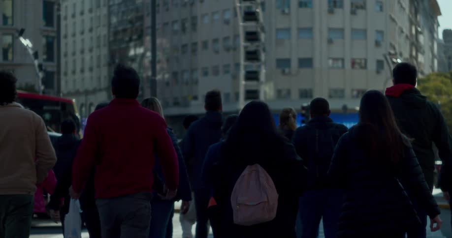 Group of people walking on a city street