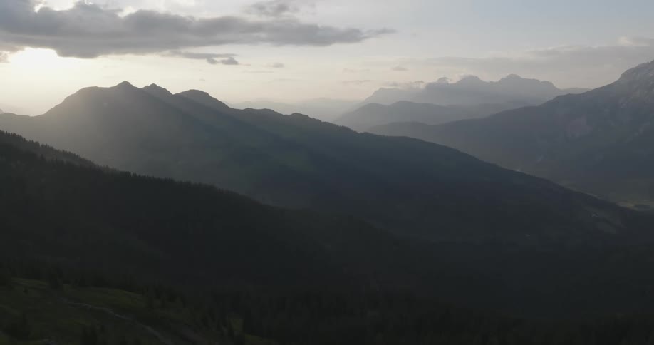 The mountains are covered with fog