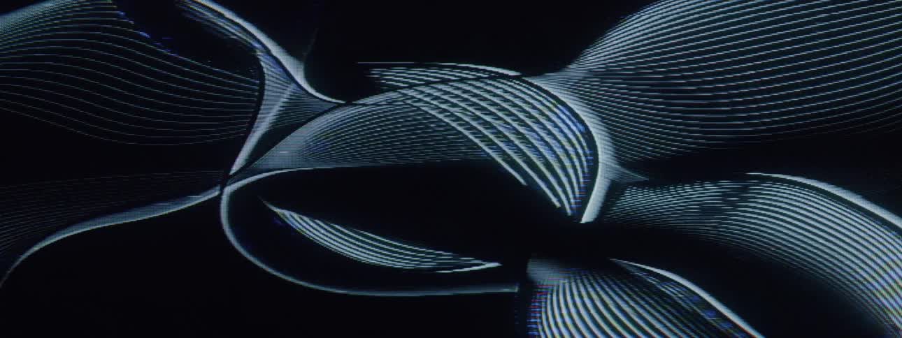 Lines crossing each other and moving in and out with brief static interruptions