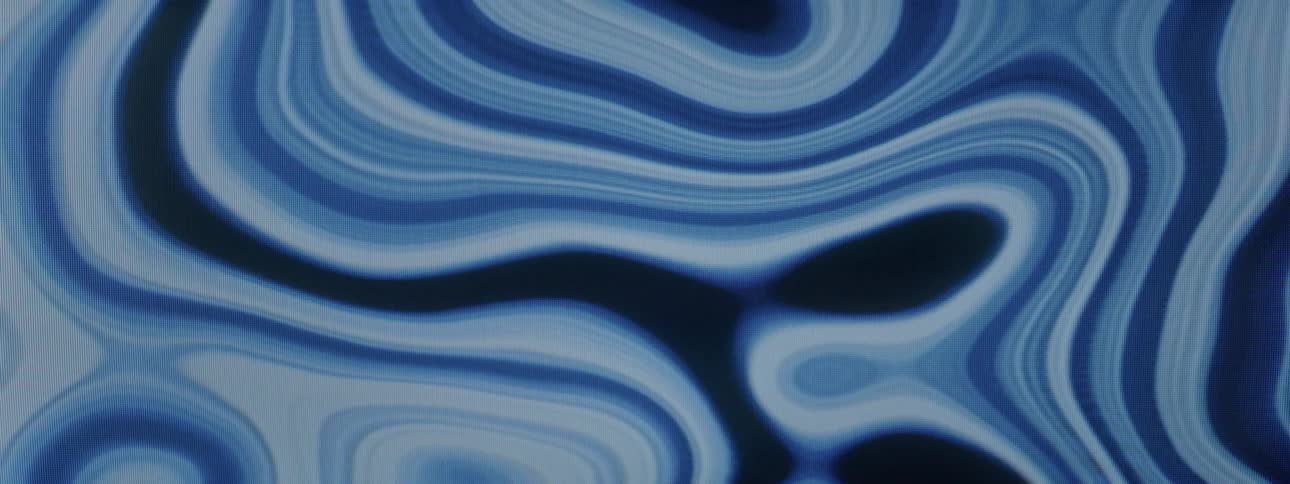 Wavy and psychedelic abstract pattern of fluid and dynamic blue colors