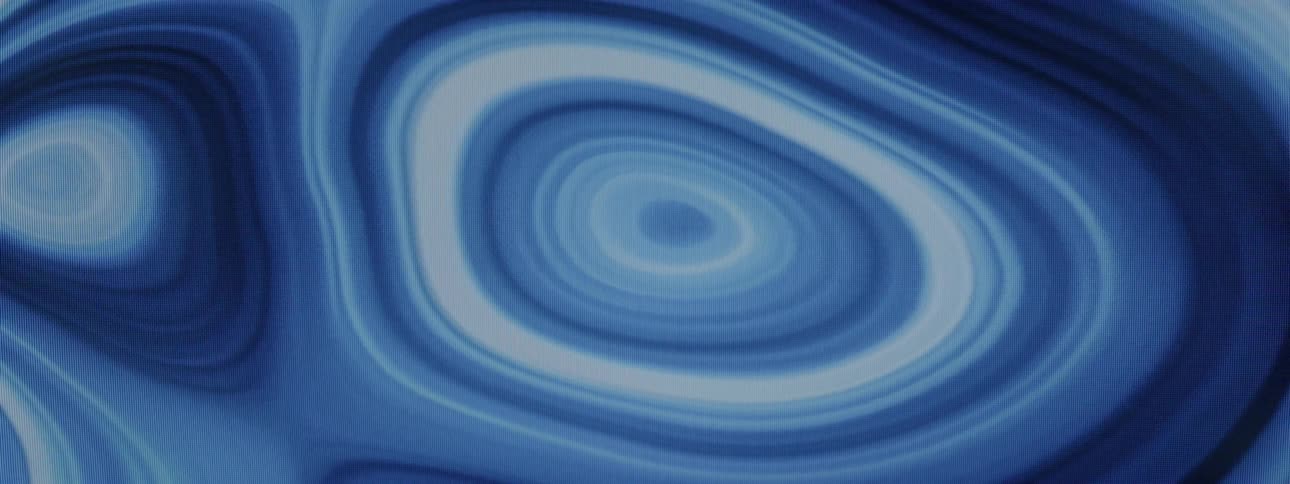 Blue liquid waves flow into each other smoothly at first then erratically