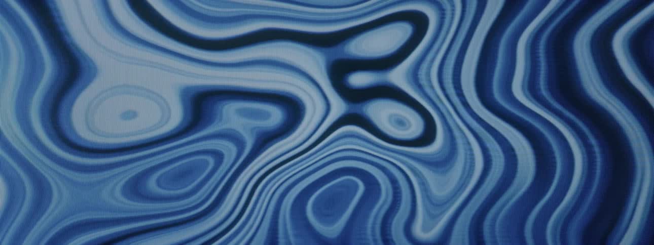 Wavy abstract pattern of fluid and dynamic blue colors