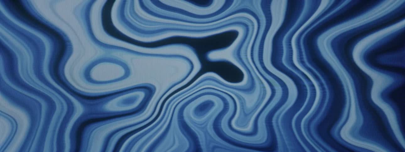 An abstract fluid of blue and white color moving randomly