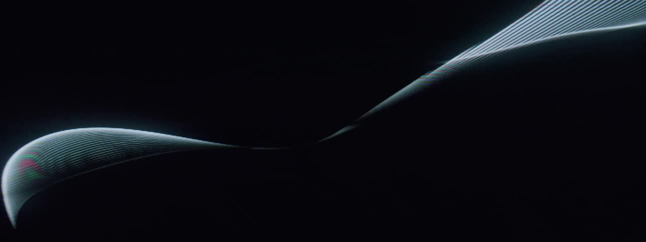 White lines curve and cross each other across the screen