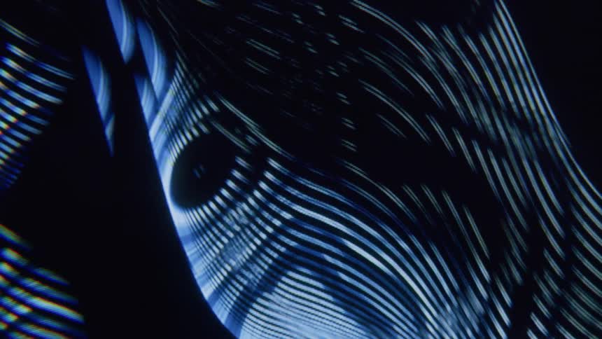 Abstract pattern of wavy blue lines on a dynamic flowing dark background
