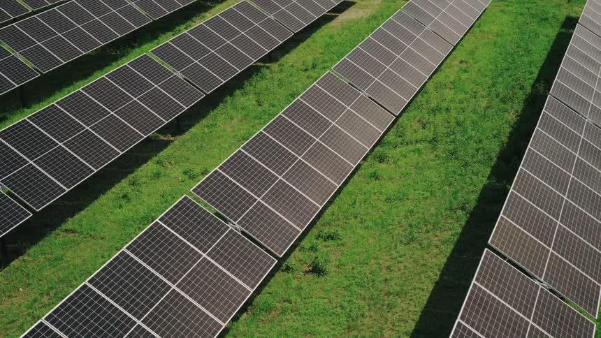 Aerial view showing details of of solar panels in summer time