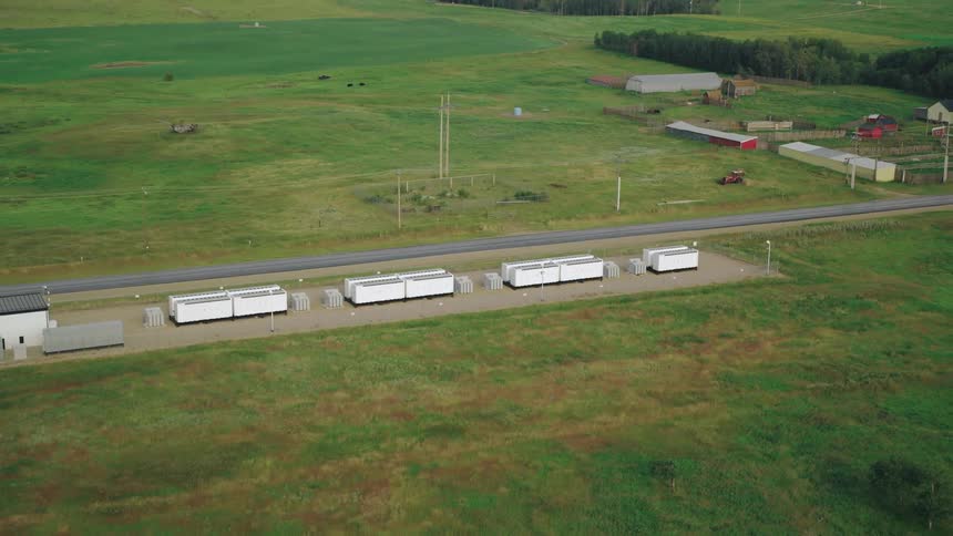 Aerial view revealing a battery storage site on the prairies