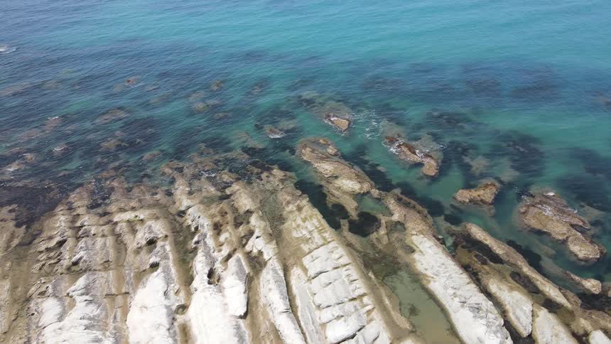 The water on the coast is blue