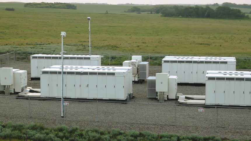 Slowly moving near a fenced battery storage system