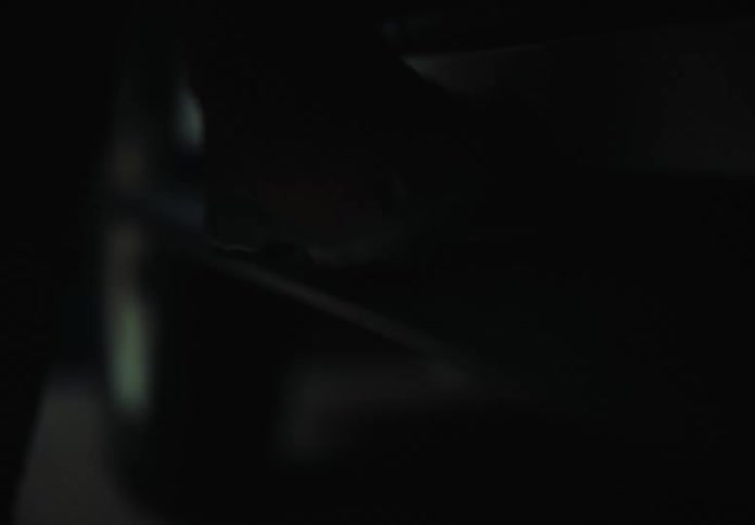 Close up shot of a persons feet as they enter a vehicle