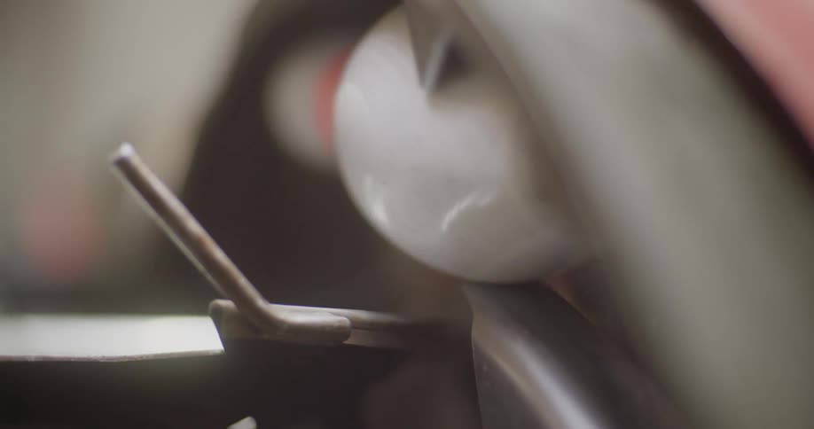 The machine feeds the bowling pins