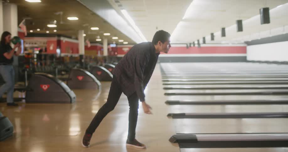 People bowling and cheering
