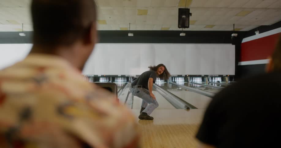 A man throws the bowling ball