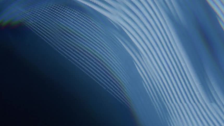 Blue patterned lines in motion against a black background