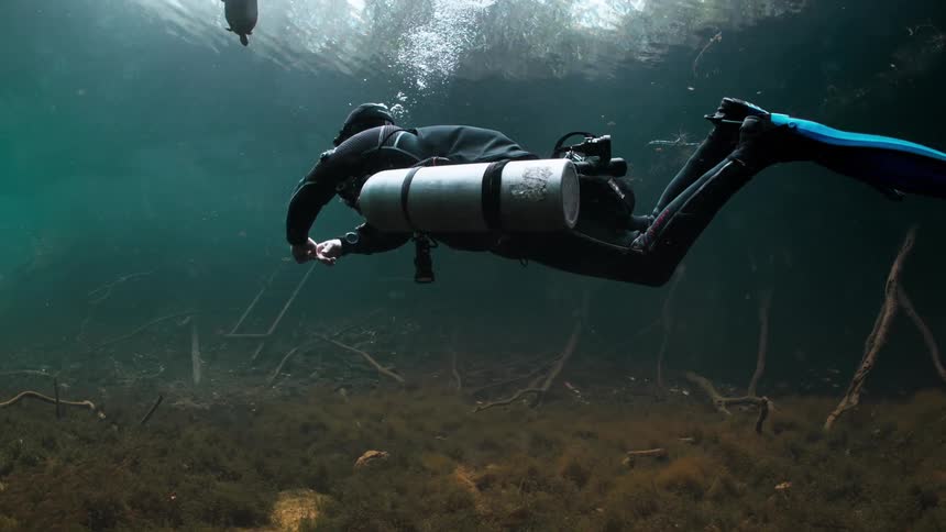 Person scuba diving underwater